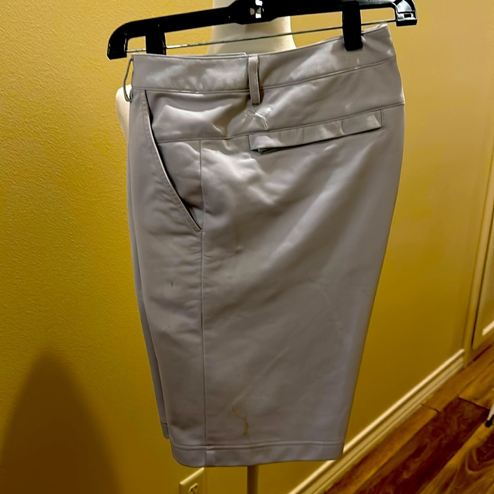 Puma golf shorts in light grey.
